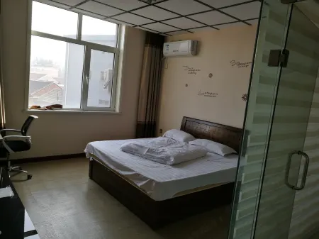 Qianxi Zhenqi Hotel Отели рядом с достопримечательностью «Lixiang Botanical Garden»