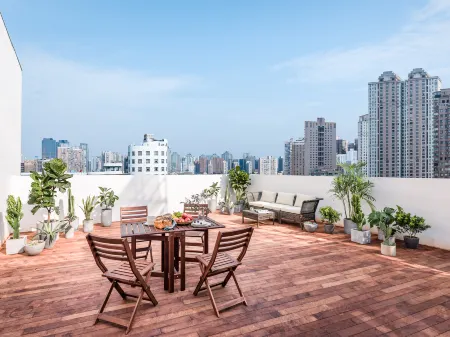 base FUXING Serviced Apartment Отели рядом с достопримечательностью «Laiyifen»