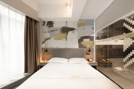 Mango Hotel (Nanjing Hexi Wanda Mochouhu Subway Station) Отели рядом с достопримечательностью «Nanjing Normal University Suiyuan Campus Multiple-use Gymnasium»