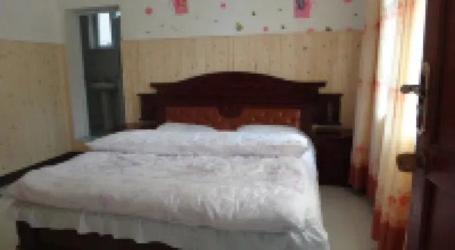 Yinjie Inn Hoteles cerca de Wulong Village