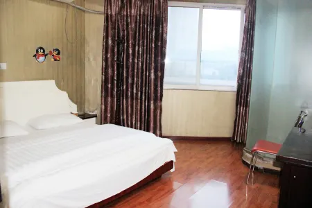 Wangcangtianxin Business Hotel Отели в г. Ванцан