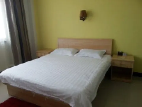Suning Ronghui Business Hotel فنادق في سونينغ