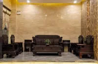 Guijia Business Hotel (Zhanjiang Wuchuan Airport)