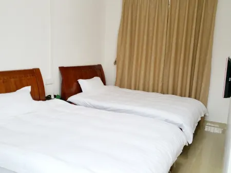 Hao Ke Hotel Отели рядом с достопримечательностью «Golden Rooster Ridge»