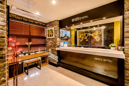 Jeju Boutique Hertz Hotel Отели рядом с достопримечательностью «Драконный головный рок»