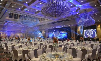 A photo of a wedding in the ballroom at Hotel Westin Davos at LN Garden Hotel Guangzhou