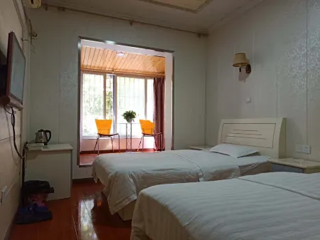 Wangcang Yayuan Hostel Отели в г. Ванцан