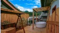 Meeting Inn (Libo Ancient Town Shop) - balcón