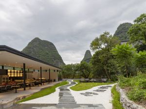 Huamengjian Hotel (Yangshuo Yulonghe Eternal Love Store)