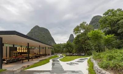 Huamengjian Hotel (Yangshuo Yulonghe Eternal Love Store) Hotel a 