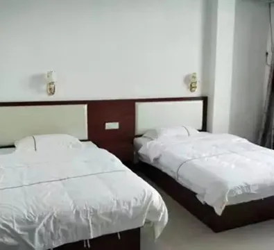 Ningming Shaoxiong Hotel