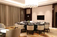 Wuyuan Xinbang Hotel (Wu Nvzhou Branch) - فطور