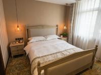 哈尔滨欧尚精品酒店 - 高级大床房