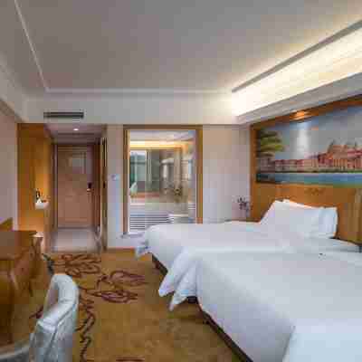 維也納酒店(新豐店) Rooms