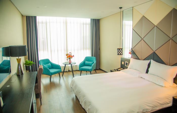 Elong Migao Fashion Hotel (Fei County New Bus Station)