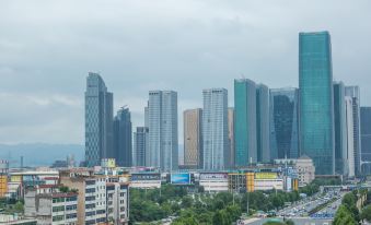 The cityscape features tall buildings and skyscrapers in the background when viewed from a distance at Byland Star Hotel (Yiwu International Trade City)