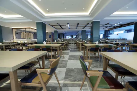 LANOU Hotel (Taibus Banner Jianshe South Road) Отели в г. Тайпусици