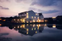 Ji Jian Resorts Отели в г. Уси