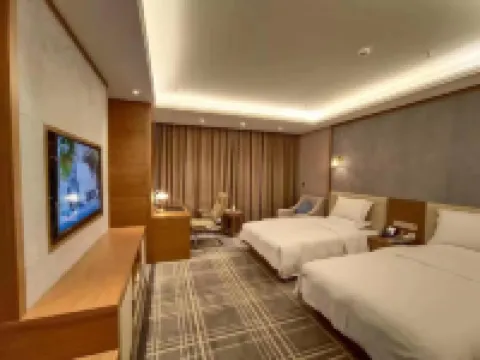 Qirui Hotel Hoteles en Huize