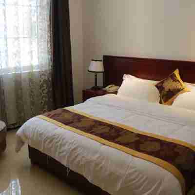 華旭商務大酒店（河口口岸店） Rooms