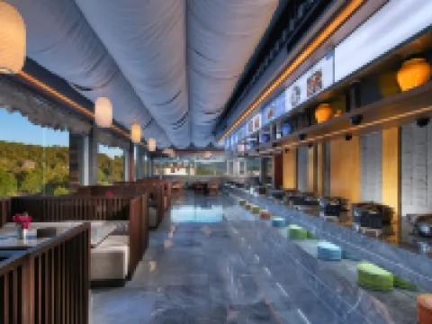 Lijiang ancient city Zangyuan snow mountain view hotel (big water wheel shop) فنادق في ليجيانغ
