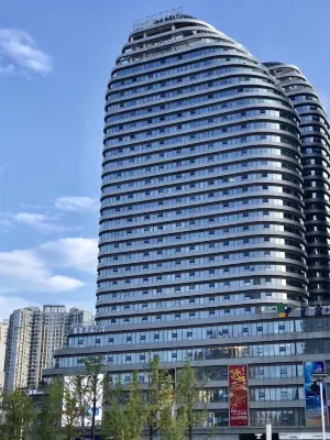 Guoguo Hotel (Xingyi Huijin Center Store) Hotel in zona Keshapo Department Store Street