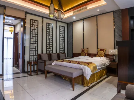 Rainbow Village Dabie Mountain Resort Отели рядом с достопримечательностью «Rainbow Waterfall Scenic Spot In The Dabie Mountains»