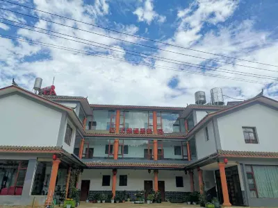 Red Land Warm Home Hostel Hotel di Distrik Dongchuan
