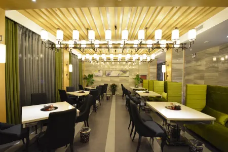 Fuya Boutique Hotel (Xinzheng Sias International College Branch) Отели рядом с достопримечательностью «Yanhuang Square»