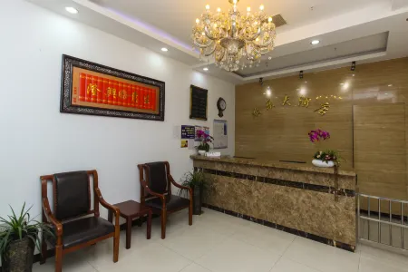 Huanle Hotel Отели рядом с достопримечательностью «Wansheng Rice Merchants»