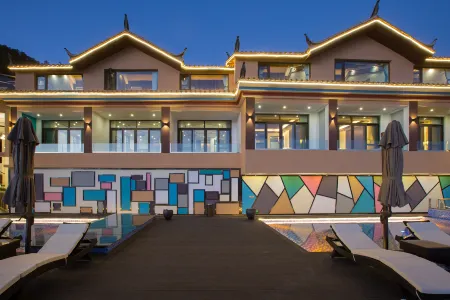 Lugu Lake Yunshang Holiday Hotel Отели рядом с достопримечательностью «Modai Wangfeifu»