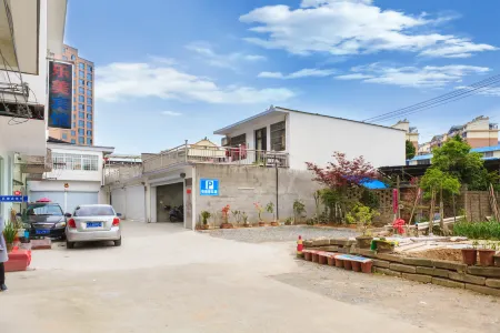 Xiuning Le Mei Hotel Отели рядом с достопримечательностью «Huangshan Panda Ecological Paradise»