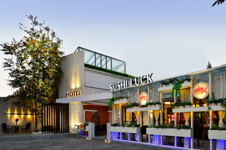 Dalian Le She Sleeping Hotel Отели рядом с достопримечательностью «Dongbei University of Finance and Economics Gymnasium»