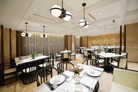 Xin Yue Wan Hotel Отели в г. Цюйфу