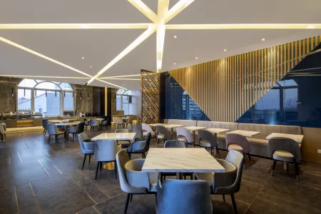 Orange Hotel (Tianjin Jinnan University Town New International Exhibition Store) Отели рядом с достопримечательностью «Tianjin Occupation Skill Public Training Center Gymnasium»