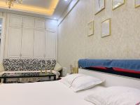 趣儿居酒店公寓(大连开发区万达店) - 淡蓝色大床房