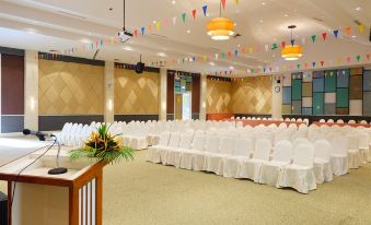 a large conference room with rows of chairs and tables set up for an event at Supalai Pasak Resort Hotel and Spa