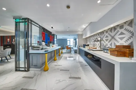 Magnotel Shanghai Minhang Wujing Отели рядом с достопримечательностью «Auxiliary Wharf of Shuitou International Rock City»