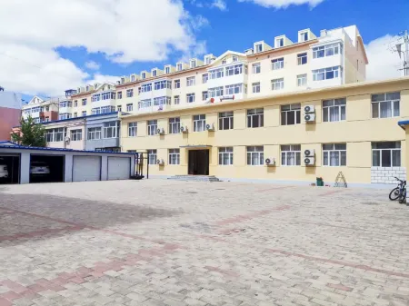 Xiwuqi Jinzun Hotel Отели рядом с достопримечательностью «Baima Cultural Park»