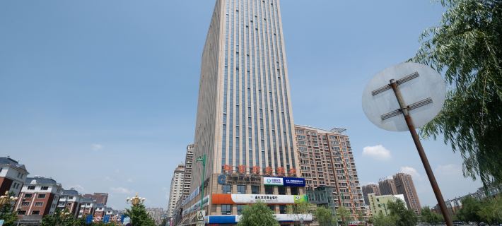 Caifu Traders Hotel Отели в г. Тунхуа