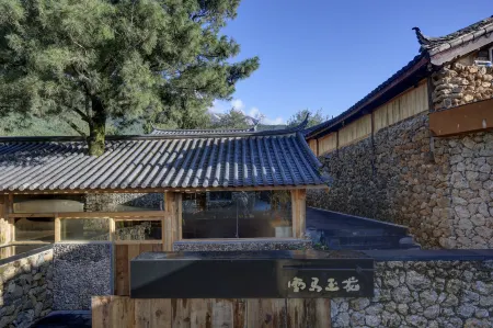 Xuema Yulong Hotel Отели рядом с достопримечательностью «Zimeihu Places of Interest»