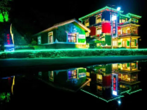 Jinuo Shanzhuang Hostel โรงแรมในเฮ่ยซุ่ย