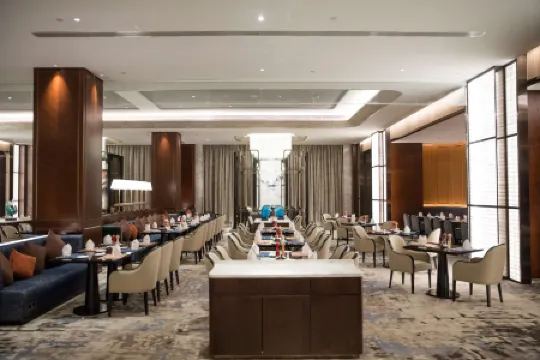 Howard Jahnson TianXi Plaza Chongqing Отели рядом с достопримечательностью «CPC Tongliang County Committee Party School»