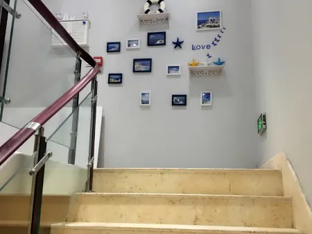 Sheyang Happy Song Theme Hotel Отели рядом с достопримечательностью «Xixin Temple»