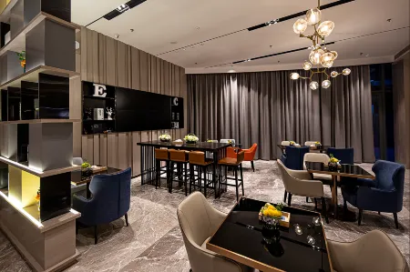 KunLunLeJu Jingxuan Hotel (Zhengzhou South China City Jinyi City) Отели рядом с достопримечательностью «Henan Mechanical and Electrical Vocational College»