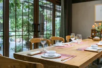 Xiang Ming Li She Tea Culture Theme Hotel - bar