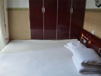 呼和浩特温馨小宾馆 - 普通大床房(无窗)(公共卫浴)