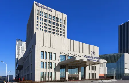 Sheraton Daqing Hotel Отели рядом с достопримечательностью «Daqing Times Square»