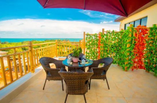 Floral· Weizhou Island Canghai Silk Road Post station(wucaitan Nanwan store) Hotel berhampiran Wucai Beach