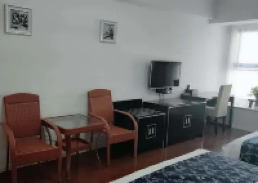 Guan County Hong Pu Traders Hotel